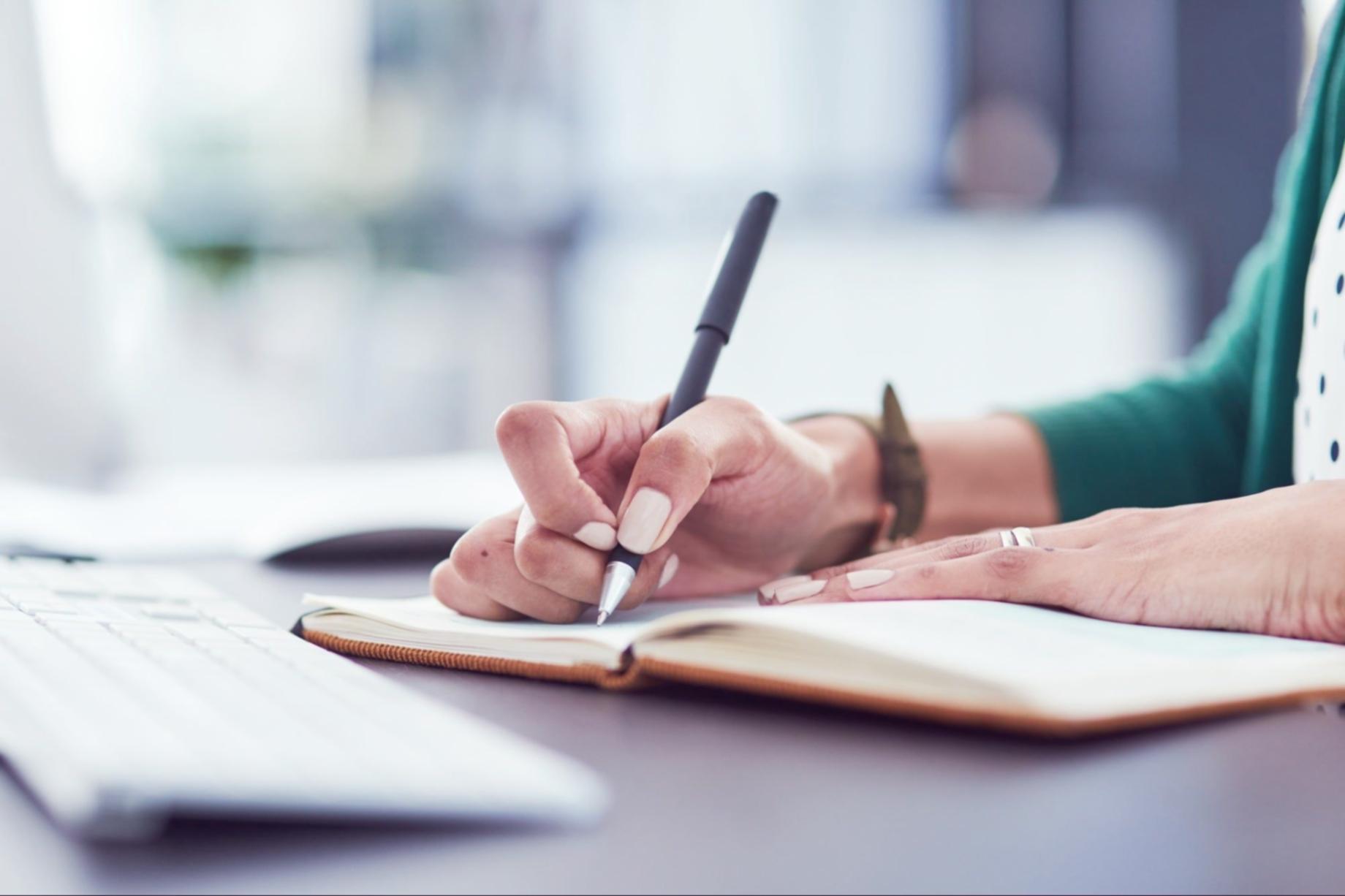 Financial analyst working on business activity breakdown dashboard